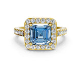 Yellow gold Fancy Blue Asscher Cut Halo Diamond Ring with Pavé Band and Three-Prong Setting