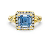 Yellow gold Fancy Blue Asscher Cut Halo Diamond Solitaire with Filigree Band and Four-Prong Setting