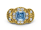 Yellow gold Fancy Blue Asscher Cut Halo Milgrain Diamond Engagement Ring with Leaf Band and Four-Prong Setting