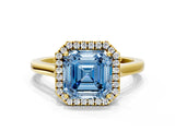 Yellow gold Fancy Blue Asscher Cut Halo Round Diamond Solitaire Ring with Pavé Band and Four-Prong Setting