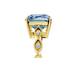 Yellow gold Fancy Blue Asscher Cut Solitaire Diamond Ring with Infinity Twist Band and Four-Prong Setting_5