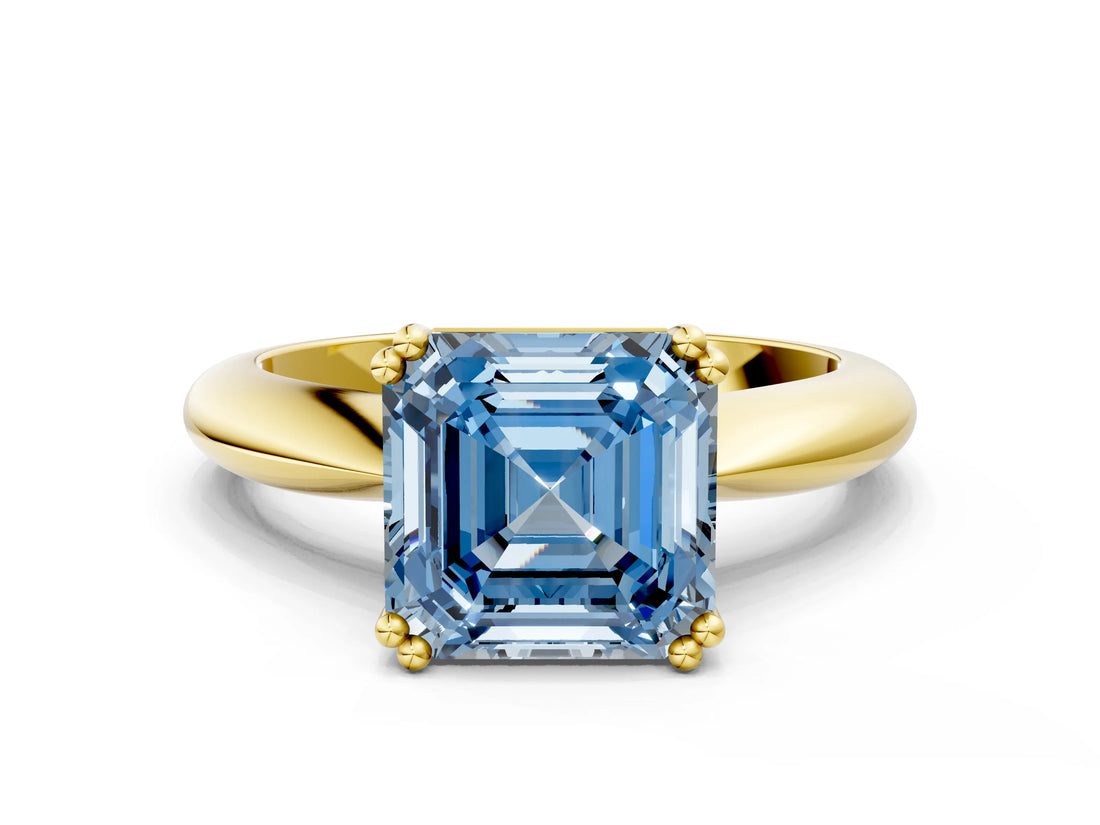 Yellow gold Fancy Blue Asscher  Cut Solitaire Engagement Ring with Tapered Band and Four-Prong Setting