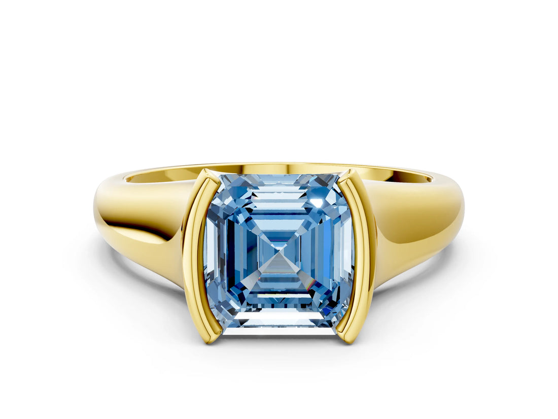 Yellow gold Fancy Blue Asscher Cut Solitaire Tension Set Diamond Ring with Split Shank Band