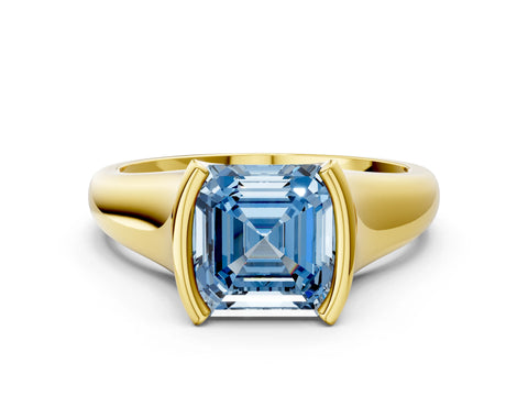 Yellow gold Fancy Blue Asscher Cut Solitaire Tension Set Diamond Ring with Split Shank Band