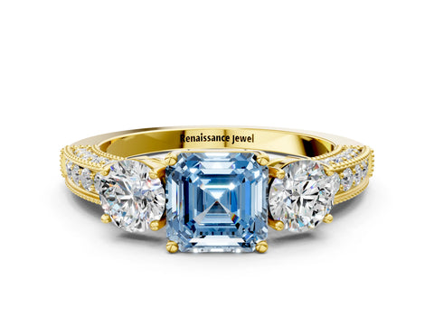 Yellow gold Fancy Blue Asscher Cut Three-Stone Diamond Ring with Pavé Band and Four-Prong Setting