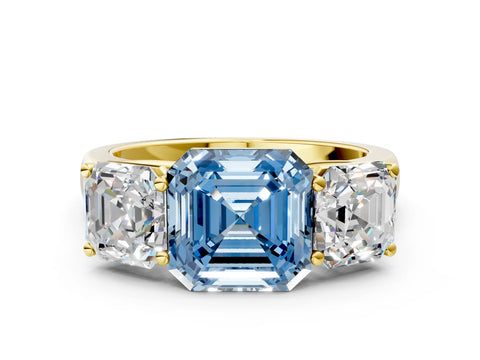 Yellow gold Fancy Blue Asscher Cut Three-Stone Diamond Ring with Prong Setting on a Classic Band