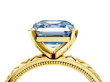 Yellow gold Fancy Blue Asscher  Solitaire Diamond Engagement Ring with XO Engraved Band and Four-Prong Setting