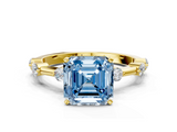 Yellow gold Fancy Blue Asscher  Solitaire Diamond Ring with Bezel Set Side Stones and Prong Setting