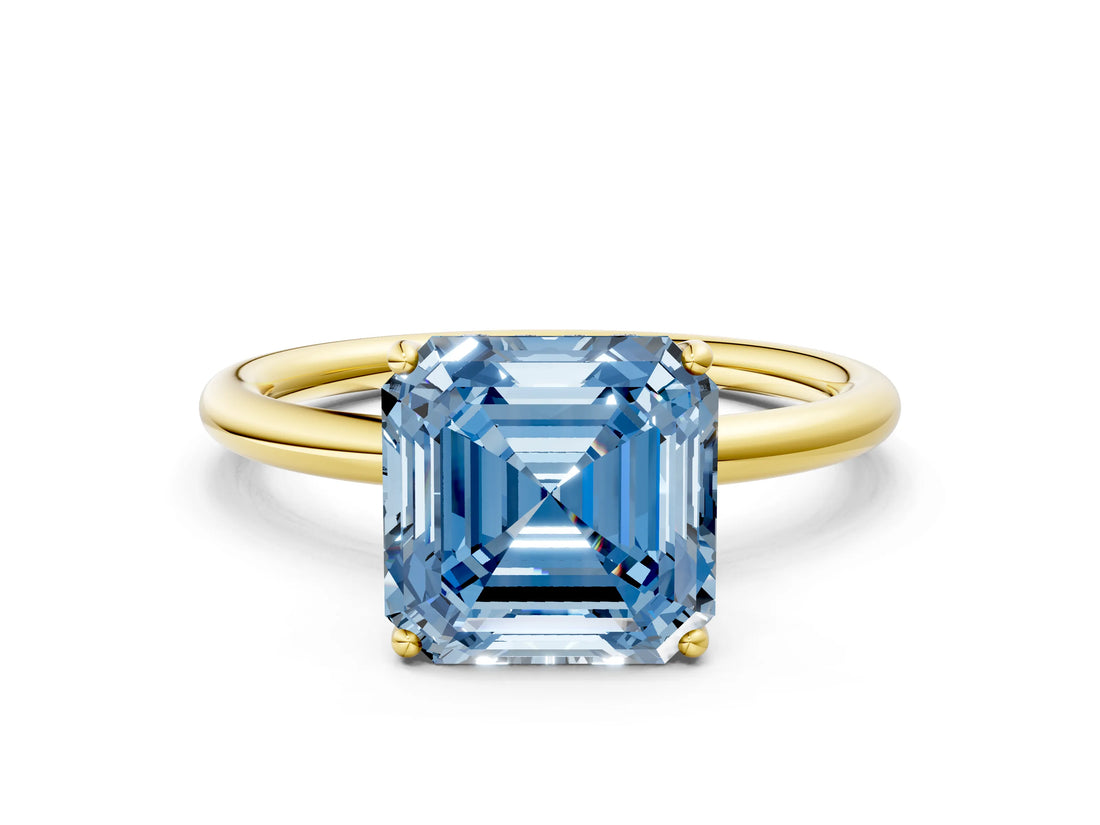 Yellow gold Fancy Blue Asscher  Solitaire Diamond Ring with a Classic Band and Four-Prong Setting