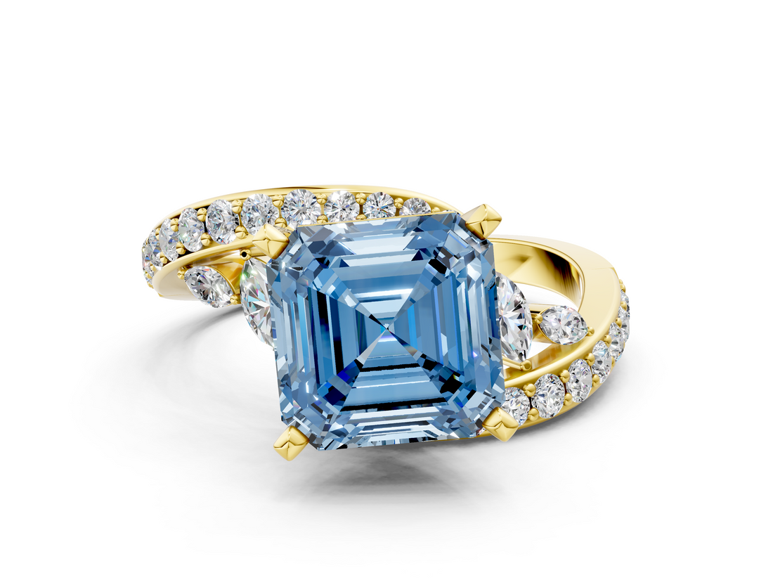 Yellow gold Fancy Blue Asscher  Solitaire with Pavé Twist Band and Four-Prong Setting