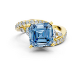 Yellow gold Fancy Blue Asscher  Solitaire with Pavé Twist Band and Four-Prong Setting