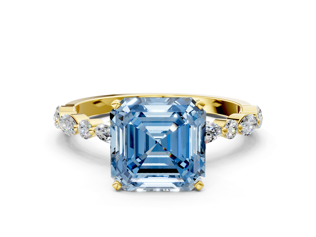 Yellow gold Fancy Blue Asscher  Solitaire with Side Stones on a Pavé Band and Four-Prong Setting
