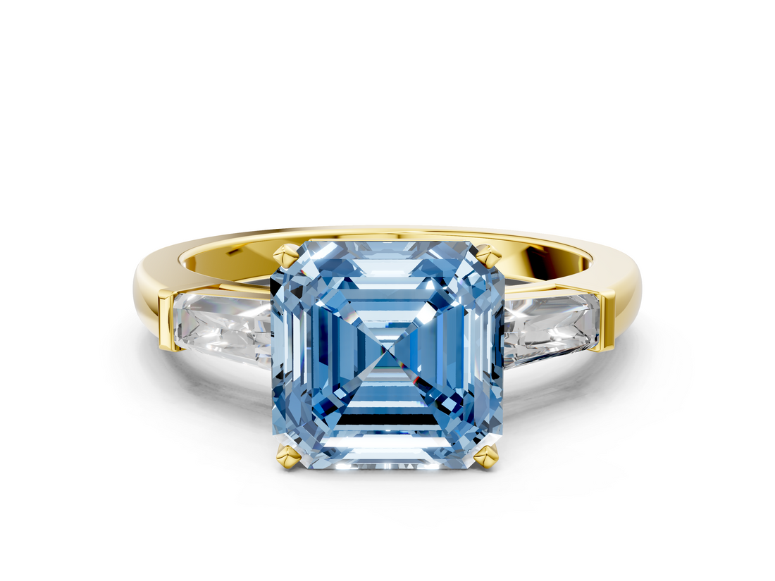 Yellow gold Fancy Blue Asscher  Solitaire with Tapered Baguette Side Stones on a Classic Band with Four-Prong Setting