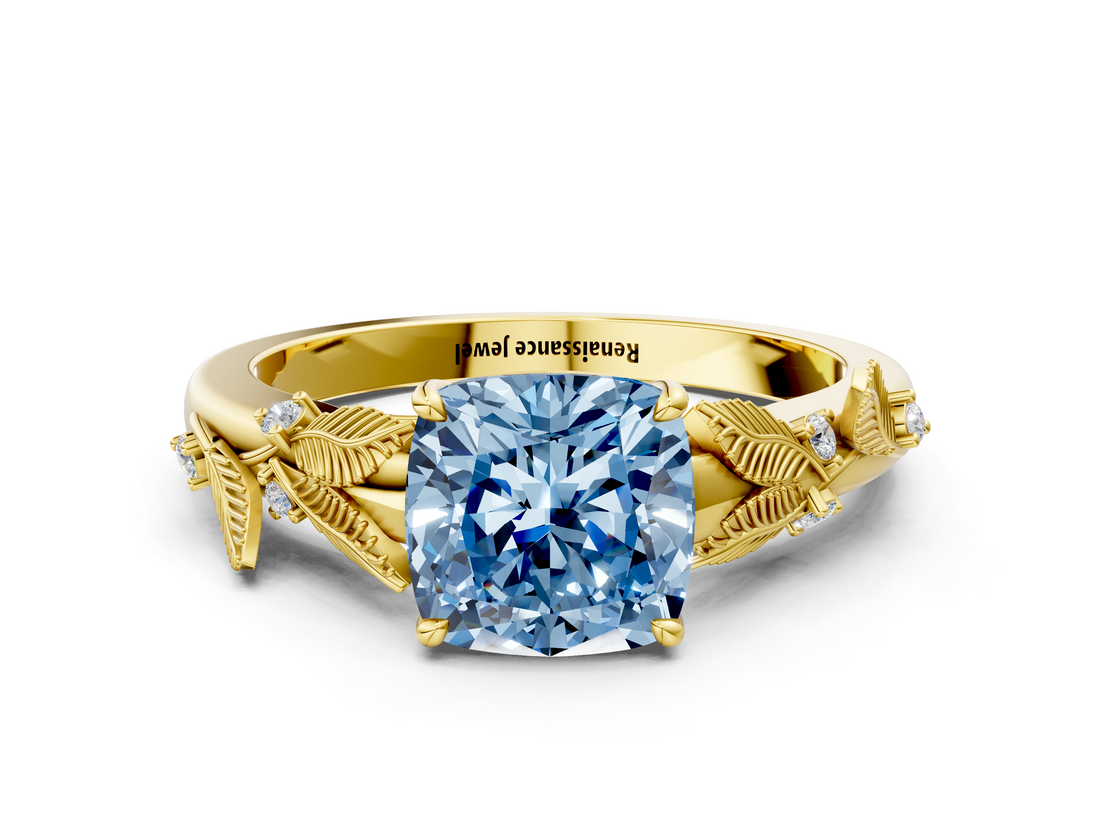 Yellow gold Fancy Blue Cushion  Brilliant Solitaire with Leaf Motif Band and Four-Prong Setting_63