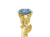 Yellow gold Fancy Blue Cushion  Brilliant Solitaire with Leaf Motif Band and Four-Prong Setting_68