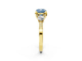 Yellow gold Fancy Blue Cushion Cut Brilliant Three-Stone Diamond Ring with Pavé Band and Four-Prong Setting_5