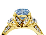 Yellow gold Fancy Blue Cushion Cut Brilliant Three-Stone Diamond Ring with Pavé Band and Four-Prong Setting_7