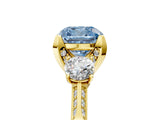 Yellow gold Fancy Blue Cushion Cut Brilliant Three-Stone Diamond Ring with Pavé Band and Four-Prong Setting_8