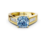 Yellow gold Fancy Blue Cushion Cut Cut Channel Set Solitaire Ring with Four-Prong Setting