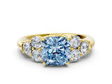 Yellow gold Fancy Blue Cushion  Cut Diamond Cluster Ring with Round Accent Stones and Prong Setting on a Classic Band_49