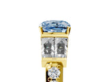 Yellow gold Fancy Blue Cushion Cut Diamond Engagement Ring with Baguette Side Stones and Channel Set Band_25