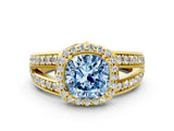 Yellow gold Fancy Blue Cushion Cut Diamond Halo Ring with Split Shank Pavé Band and Four-Prong Setting