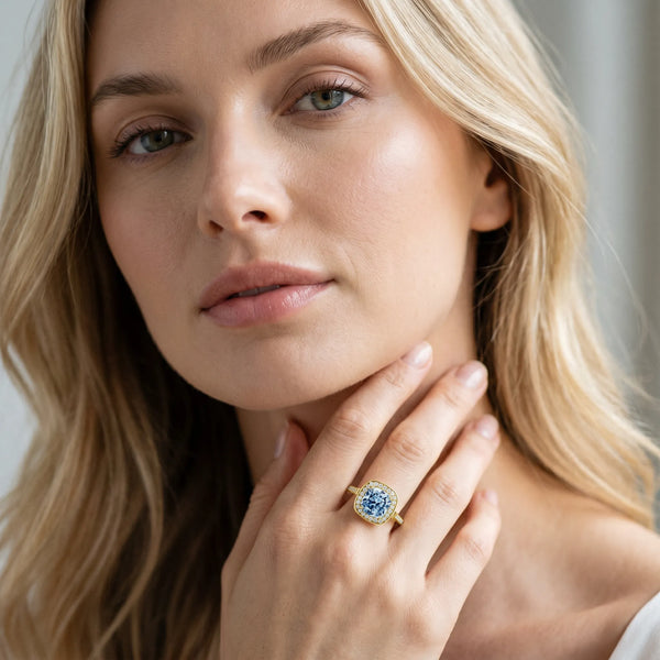 Yellow gold Fancy Blue Cushion Cut Diamond Halo Ring with Split Shank and Four-Prong Setting