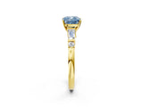 Yellow gold Fancy Blue Cushion  Cut Diamond Ring with Baguette Side Stones, Channel Set Band, and Four-Prong Setting_26