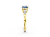 Yellow gold Fancy Blue Cushion  Cut Diamond Ring with Tapered Baguette Side Stones in Four-Prong Setting_5