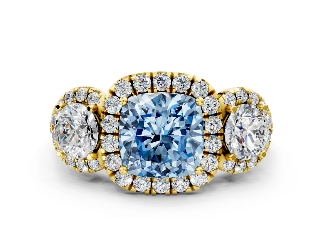 Yellow gold Fancy Blue Cushion Cut Diamond Three-Stone Halo Ring with Prong Setting and Pavé Accents