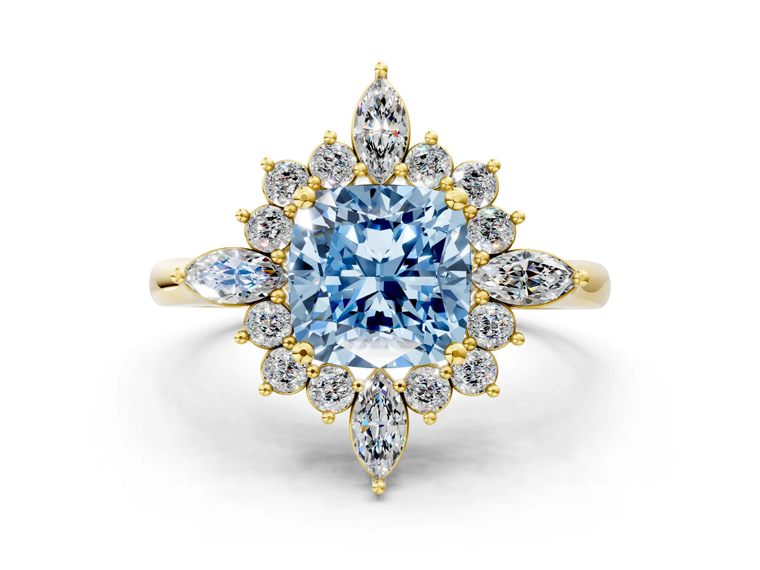 Yellow gold Fancy Blue Cushion Cut Halo Diamond Cluster Ring with Marquise and Round Stones on a White Gold Band with Prong Setting