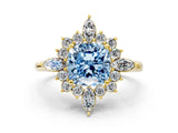 Yellow gold Fancy Blue Cushion Cut Halo Diamond Cluster Ring with Marquise and Round Stones on a White Gold Band with Prong Setting