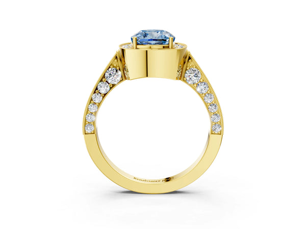Yellow gold Fancy Blue Cushion Cut Halo Diamond Engagement Ring with Split Shank Band and Four-Prong Setting