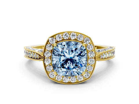 Yellow gold Fancy Blue Cushion Cut Halo Diamond Engagement Ring with Split Shank Band and Four-Prong Setting