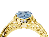 Yellow gold Fancy Blue Cushion  Cut Halo Diamond Ring with Channel Set Band and Four-Prong Setting_36