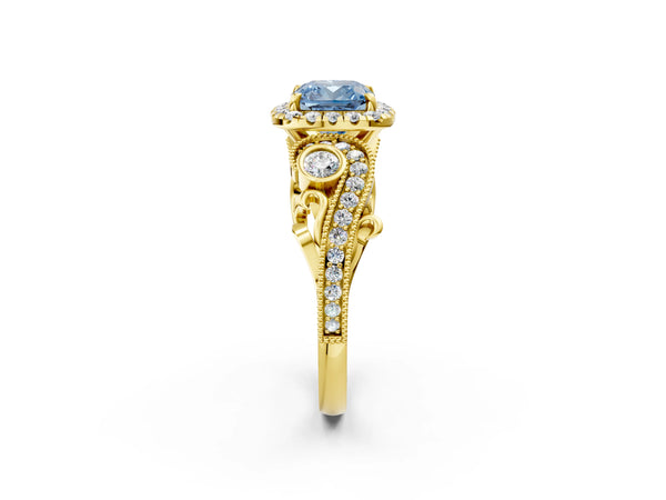 Yellow gold Fancy Blue Cushion Cut Halo Diamond Ring with Milgrain and Bezel Accents on a Split Shank Band