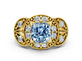 Yellow gold Fancy Blue Cushion Cut Halo Milgrain Diamond Engagement Ring with Leaf Band and Four-Prong Setting