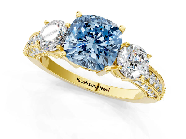 Yellow gold Fancy Blue Cushion Cut Three-Stone Diamond Ring with Pavé Band and Four-Prong Setting