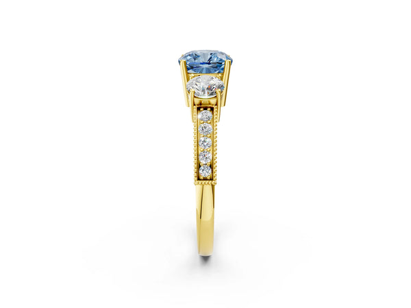 Yellow gold Fancy Blue Cushion Cut Three-Stone Diamond Ring with Pavé Band and Four-Prong Setting