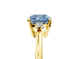 Yellow gold Fancy Blue Cushion  Cut Three-Stone Solitaire Ring with Round Accent Diamonds and Four-Prong Setting_24