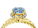 Yellow gold Fancy Blue Cushion  Halo Twisted Band Four-Prong Ring_37
