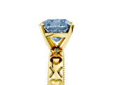 Yellow gold Fancy Blue Cushion  Solitaire Diamond Engagement Ring with XO Engraved Band and Four-Prong Setting