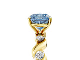 Yellow gold Fancy Blue Cushion  Solitaire Twisted Band with Prong Setting