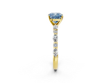 Yellow gold Fancy Blue Cushion  Solitaire with Side Stones on a Pavé Band and Four-Prong Setting_25