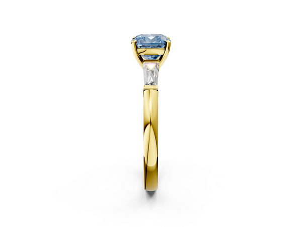 Yellow gold Fancy Blue Cushion  Solitaire with Tapered Baguette Side Stones on a Classic Band with Four-Prong Setting
