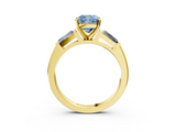 Yellow gold Fancy Blue Cushion  Solitaire with Tapered Baguette Side Stones on a Classic Band with Four-Prong Setting_90