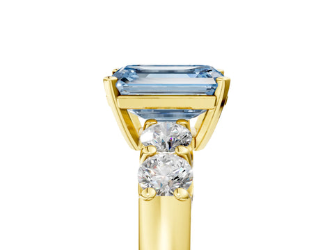 Yellow gold Fancy Blue Emerald Cut Brilliant Diamond Five-Stone Engagement Ring with Prong Setting on a Classic Band_8