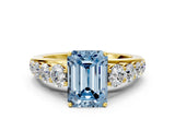Yellow gold Fancy Blue Emerald Cut Brilliant Diamond Pavé Band with Six-Prong Setting