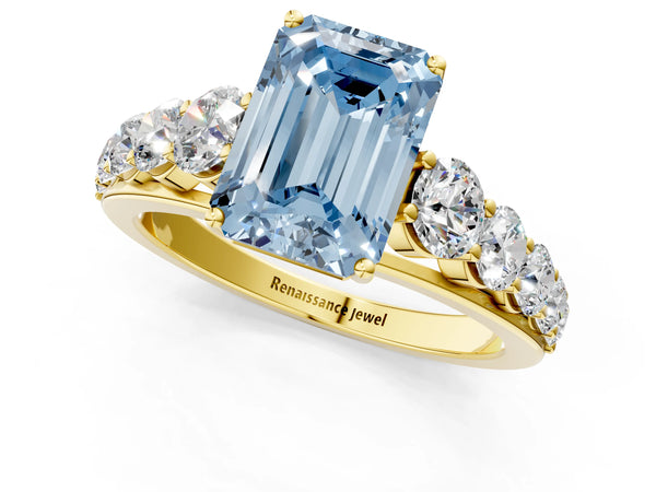 Yellow gold Fancy Blue Emerald Cut Brilliant Diamond Pavé Band with Six-Prong Setting