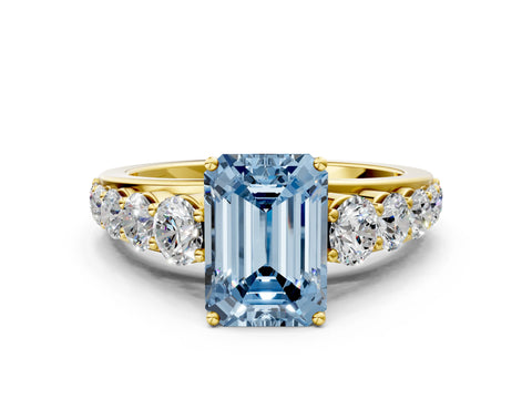 Yellow gold Fancy Blue Emerald Cut Brilliant Diamond Pavé Band with Six-Prong Setting